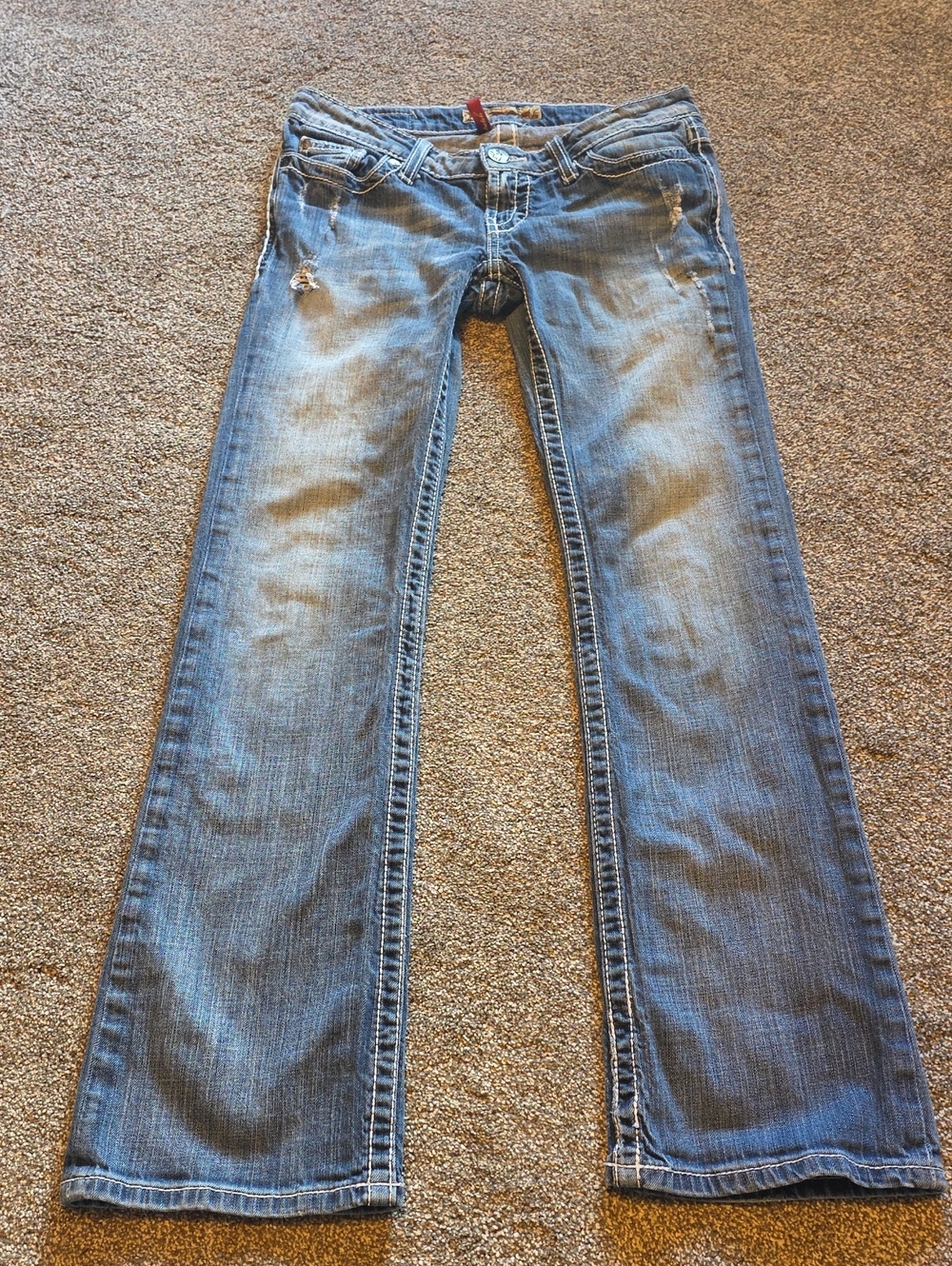 Light Blue Women's Flare Jeans with Subtle Distressing